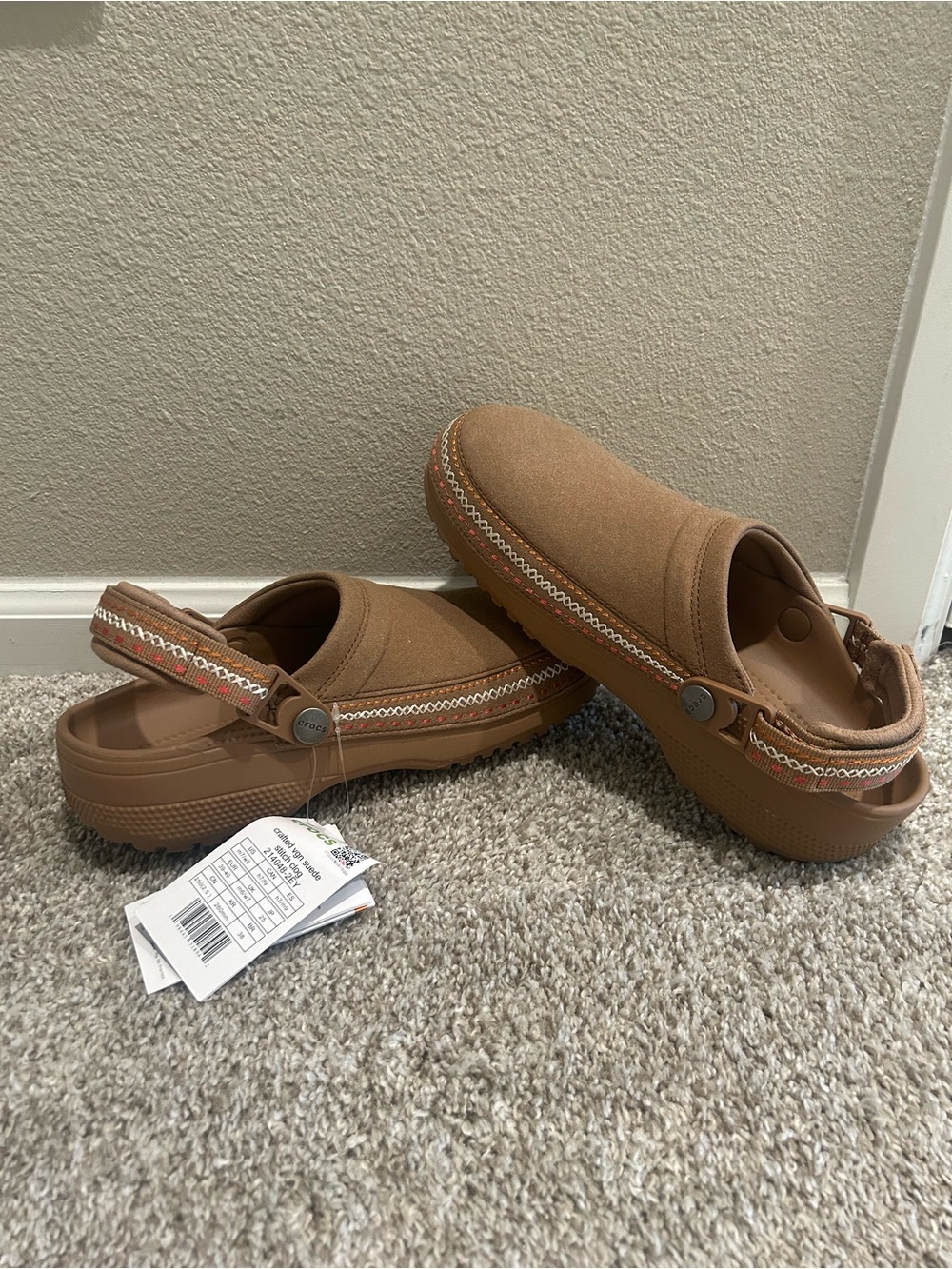 Crocs Slip-On Suede Clogs in Tan with fall detailing. Fit size 8.5W